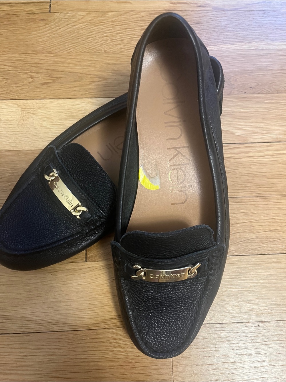 Calvin Klein Black Leather Loafers with Gold Accent